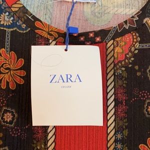 Zara Crinkle Peplum top